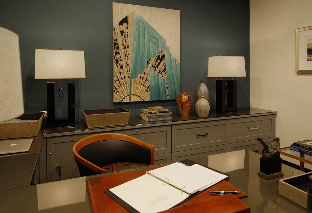 Office with custom desk and filing cabinets.