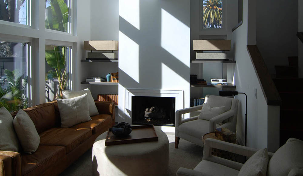 The strong shadows of afternoon sun work well in this space and would have made artwork above the fireplace hard to discern.