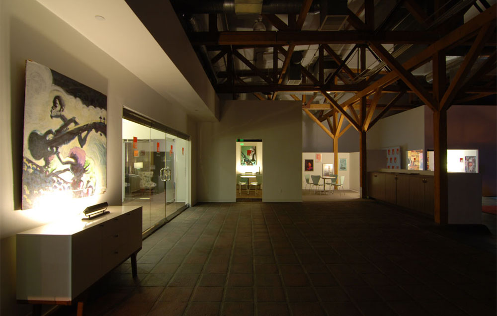 Faculty offices surround the stage area.