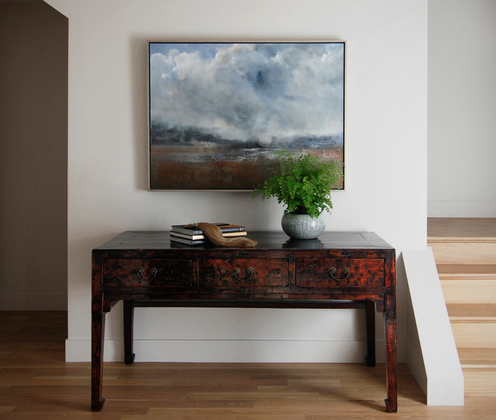 Oyster white walls with white oak waxed floors and a great Chinese antique.
